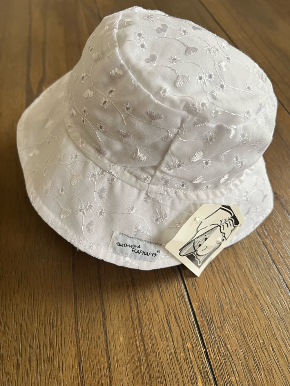 2 Flap Happy Bucket Hats 2
Hats pink and white UPF 50+,
NWTs